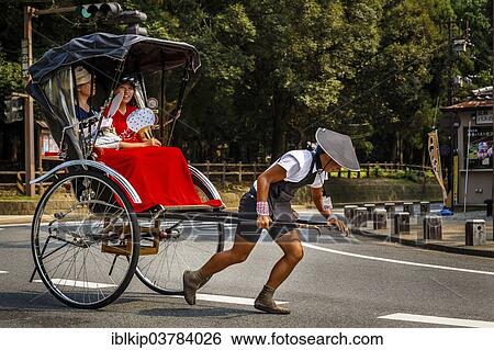 "Rickshaw with passengers, Arashiyama, Kyoto, Japan, Asia" View Large Photo Image Stock Photograph - "Rickshaw with passengers, Arashiyama, Kyoto, Japan, Asia". Fotosearch