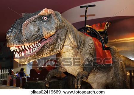 Ride a Dino for teenagers, moving dinosaurs, Mall of the Emirates, shopping centre, Dubai, United Arab Emirates, Middle East, Asia View Large Photo Image Stock Photo - Ride a Dino for teenagers, moving dinosaurs, Mall of the Emirates, shopping centre, Dubai, United Arab Emirates, Middle East, Asia. Fotosearch