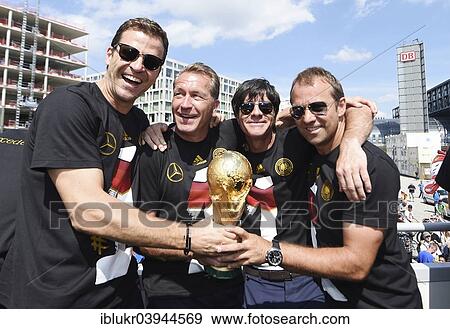 "Ride on a truck, reception of the German national team after their victory at the FIFA World Cup 2014, fan party at the Brandenburg Gate, Berlin, Germany, Europe" View Large Photo Image Stock Photo - "Ride on a truck, reception of the German national team after their victory at the FIFA World Cup 2014, fan party at the Brandenburg Gate, Berlin, Germany, Europe". Fotosearch