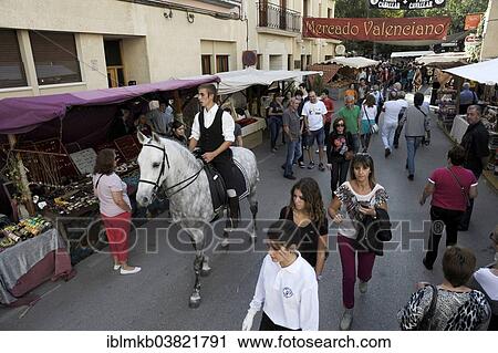 Stock Image - "Rider on Andalusian horse at the annual All Saints Market in Cocentaina, Alicante province, Spain, Europe". Fotosearch