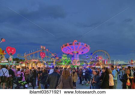 "Rides and visitors to the Oktoberfest, Munich, Upper Bavaria, Bavaria, Germany, Europe" View Large Photo Image Stock Image - "Rides and visitors to the Oktoberfest, Munich, Upper Bavaria, Bavaria, Germany, Europe". Fotosearch