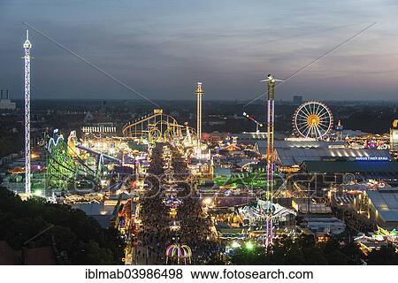 "Rides at the Oktoberfest, evening mood, Oktoberfest, Theresienwiese, Munich, Upper Bavaria, Bavaria, Germany, Europe" View Large Photo Image Stock Photo - "Rides at the Oktoberfest, evening mood, Oktoberfest, Theresienwiese, Munich, Upper Bavaria, Bavaria, Germany, Europe". Fotosearch