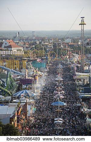 "Rides on the fairground road with Olympia Looping, Funferlooping roller coaster, Oktoberfest, Theresienwiese, Munich, Upper Bavaria, Bavaria, Germany, Europe" View Large Photo Image Stock Photo - "Rides on the fairground road with Olympia Looping, Funferlooping roller coaster, Oktoberfest, Theresienwiese, Munich, Upper Bavaria, Bavaria, Germany, Europe". Fotosearch