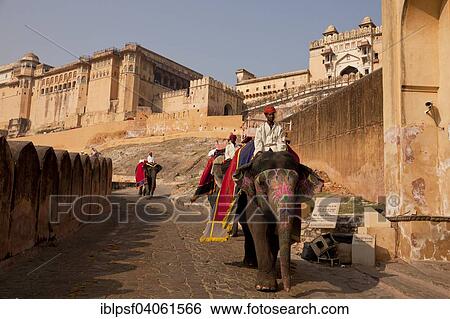 Stock Photograph - "Riding elephants for tourists in front of the Amber Fort, Jaipur, Rajasthan, India, Asia". Fotosearch