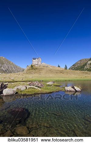 "Rifugio Migliorero, refuge with a lake and a peat bog, Valle Stura di Demonte valley, Piedmont, Italy, Europe" View Large Photo Image Stock Image - "Rifugio Migliorero, refuge with a lake and a peat bog, Valle Stura di Demonte valley, Piedmont, Italy, Europe". Fotosearch