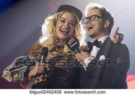 "Rita Ora, a British singer, model and actress of Kosovar Albanian descent, singing live at the Energy Stars For Free event, Zurich Hallenstadion hall, Zurich, Switzerland, Europe" View Large Photo Image Stock Photo - "Rita Ora, a British singer, model and actress of Kosovar Albanian descent, singing live at the Energy Stars For Free event, Zurich Hallenstadion hall, Zurich, Switzerland, Europe". Fotosearch