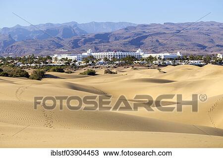 "RIU hotel on the beach with dunes at Maspalomas, Dunas de Maspalomas, Gran Canaria, Canary Islands, Spain, Europe" View Large Photo Image Stock Image - "RIU hotel on the beach with dunes at Maspalomas, Dunas de Maspalomas, Gran Canaria, Canary Islands, Spain, Europe". Fotosearch