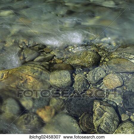 Stock Photo - "River bed, pebbles, France, Europe". Fotosearch