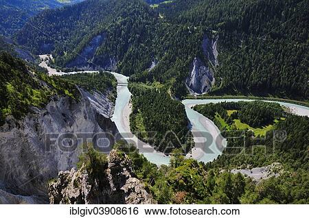Stock Photograph - "River bend of the Vorderrhein with railway bridge of the Rhaetian Railway, Ruinaulta valley, near Illanz, Canton of Graubunden, Switzerland, Europe". Fotosearch