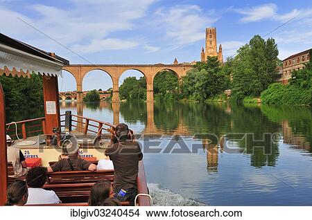"River cruise on the Tarn River, in front of Albi Cathedral, formally the Cathedral of Saint Cecilia, Cathedrale Sainte-Cecile d'Albi, historic center, Albi, Departement Tarn, Midi-Pyrenees, France, Europe" View Large Photo Image Picture - "River cruise on the Tarn River, in front of Albi Cathedral, formally the Cathedral of Saint Cecilia, Cathedrale Sainte-Cecile d'Albi, historic center, Albi, Departement Tarn, Midi-Pyrenees, France, Europe". Fotosearch