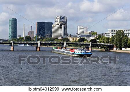 "River Main, Friedensbrucke Bridge, and Westhafen Tower, Frankfurt am Main, Hesse, Germany, Europe" View Large Photo Image Stock Photo - "River Main, Friedensbrucke Bridge, and Westhafen Tower, Frankfurt am Main, Hesse, Germany, Europe". Fotosearch