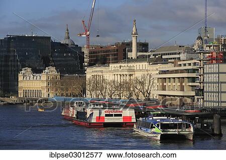 "River Thames with tourist ships, Billingsgate Market, Custom House and The Monument seen from Tower Bridge, City of London, London, London region, England, United Kingdom, Europe" View Large Photo Image Stock Photo - "River Thames with tourist ships, Billingsgate Market, Custom House and The Monument seen from Tower Bridge, City of London, London, London region, England, United Kingdom, Europe". Fotosearch