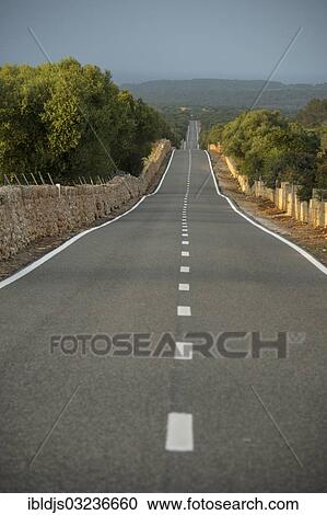 "Road and landscape with dry stone walls, Manacor, Majorca, Balearic Islands, Spain, Europe" View Large Photo Image Stock Image - "Road and landscape with dry stone walls, Manacor, Majorca, Balearic Islands, Spain, Europe". Fotosearch