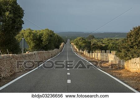 "Road and landscape with dry stone walls, Manacor, Majorca, Balearic Islands, Spain, Europe" View Large Photo Image Stock Photograph - "Road and landscape with dry stone walls, Manacor, Majorca, Balearic Islands, Spain, Europe". Fotosearch