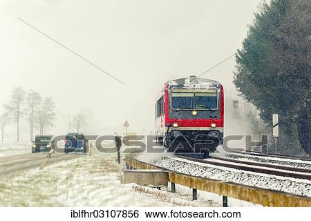 "Road and rail transport in winter with snow, Grevenbroich, Rhineland, North Rhine-Westphalia, Germany, Europe" View Large Photo Image Stock Photograph - "Road and rail transport in winter with snow, Grevenbroich, Rhineland, North Rhine-Westphalia, Germany, Europe". Fotosearch