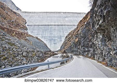 "Road at the largest concrete dam in Switzerland, the Grande Dixence dam, Val d'Herens valley, near Sion, Valais, Switzerland, Europe" View Large Photo Image Stock Photo - "Road at the largest concrete dam in Switzerland, the Grande Dixence dam, Val d'Herens valley, near Sion, Valais, Switzerland, Europe". Fotosearch