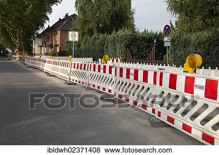 Stock Photo - "Road barriers along a construction site, renewal of supply lines, Im Telgei street, Dortmund, Ruhr area, North Rhine-Westphalia, Germany, Europe, PublicGround, Europe". Fotosearch