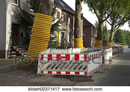 Stock Photo - "Road barriers along a construction site, renewal of supply lines, Im Telgei street, Dortmund, Ruhr area, North Rhine-Westphalia, Germany, Europe, PublicGround, Europe". Fotosearch