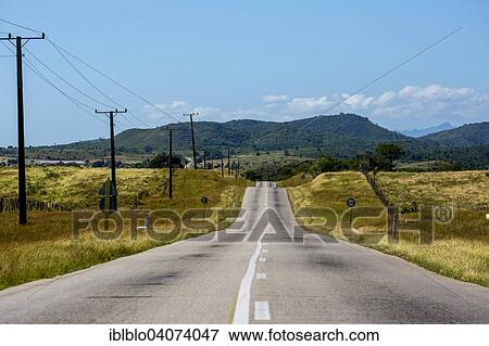 "Road between Santa Clara and Trinidad, Valley of Ingenios, Valle de los Ingenios, Cuba, North America" View Large Photo Image Stock Photo - "Road between Santa Clara and Trinidad, Valley of Ingenios, Valle de los Ingenios, Cuba, North America". Fotosearch