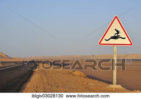 "Road sign """"Caution Surfers"""" at the Rio de Oro Bay, Westsahara, bei Dakhla, Oued Ed-Dahab-Lagouira region, Morocco, Africa" View Large Photo Image Stock Image - "Road sign """"Caution Surfers"""" at the Rio de Oro Bay, Westsahara, bei Dakhla, Oued Ed-Dahab-Lagouira region, Morocco, Africa". Fotosearch