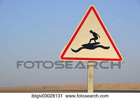 road-sign-caution-surfers-at-stock-image