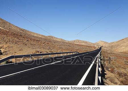 "Road through a barren mountain landscape, nahe Pajara, Fuerteventura, Canary Islands, Spain, Europe" View Large Photo Image Stock Photo - "Road through a barren mountain landscape, nahe Pajara, Fuerteventura, Canary Islands, Spain, Europe". Fotosearch