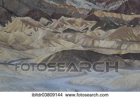 "Road through the badlands of the """"Twenty Mule Team Canyon"""" at dawn, Death Valley, Death Valley National Park, California, USA" View Large Photo Image Picture - "Road through the badlands of the """"Twenty Mule Team Canyon"""" at dawn, Death Valley, Death Valley National Park, California, USA". Fotosearch