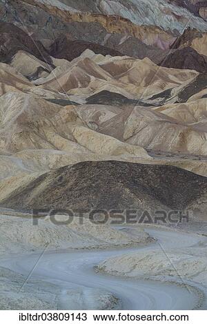 "Road through the badlands of the """"Twenty Mule Team Canyon"""" at dawn, Death Valley, Death Valley National Park, California, USA" View Large Photo Image Stock Image - "Road through the badlands of the """"Twenty Mule Team Canyon"""" at dawn, Death Valley, Death Valley National Park, California, USA". Fotosearch
