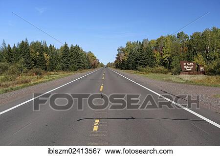 Road through the Ottawa National Forest on the Upper Peninsula of Michigan, USA View Large Photo Image Stock Photo - Road through the Ottawa National Forest on the Upper Peninsula of Michigan, USA. Fotosearch