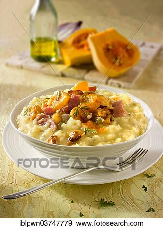Roast butternut squash on saffron risotto View Large Photo Image Stock Photo - Roast butternut squash on saffron risotto. Fotosearch