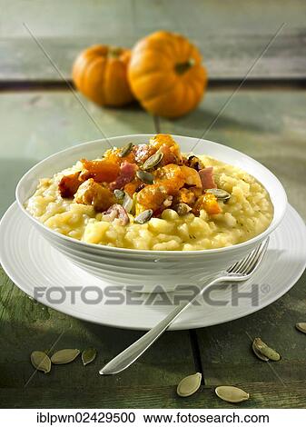 Roast pumpkin and bacon on saffron risotto View Large Photo Image Stock Image - Roast pumpkin and bacon on saffron risotto. Fotosearch