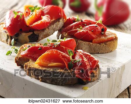 "Roasted red peppers on toasted rye bread, bruschetta" View Large Photo Image Stock Photo - "Roasted red peppers on toasted rye bread, bruschetta". Fotosearch