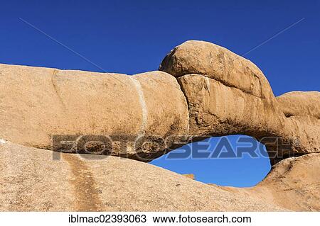 "Rock arch, near the Spitzkoppe granite peaks, Damaraland, Namibia, Africa" View Large Photo Image Stock Image - "Rock arch, near the Spitzkoppe granite peaks, Damaraland, Namibia, Africa". Fotosearch