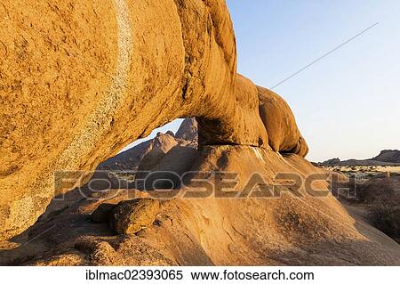 "Rock arch, Spitzkoppe granite peaks at the back, Damaraland, Namibia, Africa" View Large Photo Image Stock Photography - "Rock arch, Spitzkoppe granite peaks at the back, Damaraland, Namibia, Africa". Fotosearch