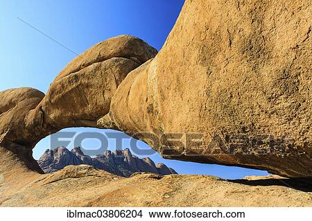 Picture - "Rock bridge, behind the Pontok Mountains, Damaraland, Namibia, Africa". Fotosearch