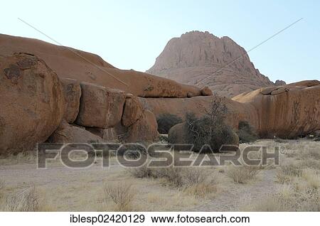 Rock formations and Great Spitzkoppe Mountain, Spitzkoppe, Grosse Spitzkuppe Nature Reserve, Namibia, Africa View Large Photo Image Stock Photo - Rock formations and Great Spitzkoppe Mountain, Spitzkoppe, Grosse Spitzkuppe Nature Reserve, Namibia, Africa. Fotosearch
