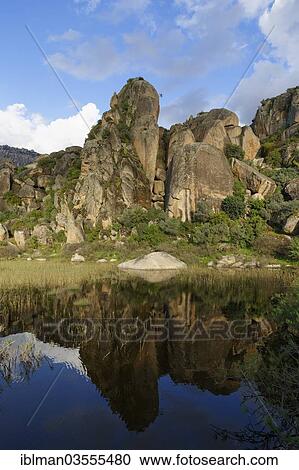Stock Image - "Rock formations at the lakeside, Lake Bafa, Besparmak Mountains, Mugla Province, Aegean region, Turkey, Asia". Fotosearch