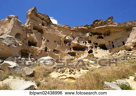 "Rock houses of Cauvsin, Cappadocia, Turkey, Asia" View Large Photo Image Stock Photograph - "Rock houses of Cauvsin, Cappadocia, Turkey, Asia". Fotosearch