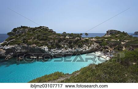 "Rock-lined bay and beach of Cala S'Almunia, Santanyi, Mallorca, Majorca, Balearic Islands, Spain, Europe" View Large Photo Image Stock Photo - "Rock-lined bay and beach of Cala S'Almunia, Santanyi, Mallorca, Majorca, Balearic Islands, Spain, Europe". Fotosearch