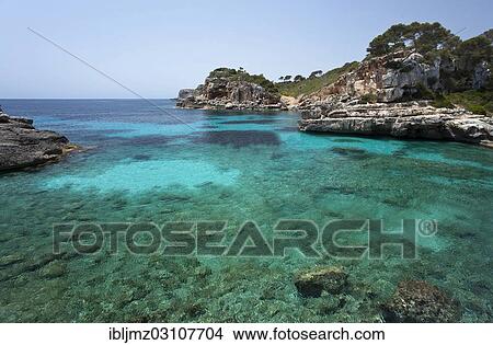 "Rock-lined bay of Calo des Moro, Santanyi, Mallorca, Majorca, Balearic Islands, Spain, Europe" View Large Photo Image Picture - "Rock-lined bay of Calo des Moro, Santanyi, Mallorca, Majorca, Balearic Islands, Spain, Europe". Fotosearch