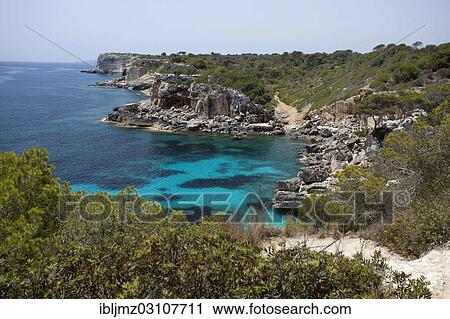 "Rock-lined bay of Calo des Moro, Santanyi, Mallorca, Majorca, Balearic Islands, Spain, Europe" View Large Photo Image Stock Image - "Rock-lined bay of Calo des Moro, Santanyi, Mallorca, Majorca, Balearic Islands, Spain, Europe". Fotosearch