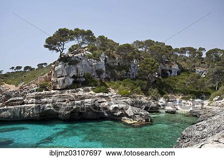 "Rock-lined bay of Calo des Moro, Santanyi, Mallorca, Majorca, Balearic Islands, Spain, Europe" View Large Photo Image Stock Photo - "Rock-lined bay of Calo des Moro, Santanyi, Mallorca, Majorca, Balearic Islands, Spain, Europe". Fotosearch
