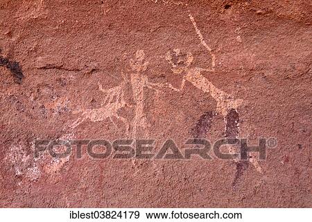 "Rock painting of people with dogs, neolithic rock art, Tadrart region, Tassili n'Ajjer National Park, Unesco World Heritage Site, Algeria, Sahara, North Africa, Africa" View Large Photo Image Stock Photo - "Rock painting of people with dogs, neolithic rock art, Tadrart region, Tassili n'Ajjer National Park, Unesco World Heritage Site, Algeria, Sahara, North Africa, Africa". Fotosearch