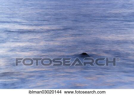 "Rock poking out of the sea in the evening, La Puntilla, Valle Gran Rey, La Gomera, Canary Islands, Spain, Europe" View Large Photo Image Picture - "Rock poking out of the sea in the evening, La Puntilla, Valle Gran Rey, La Gomera, Canary Islands, Spain, Europe". Fotosearch