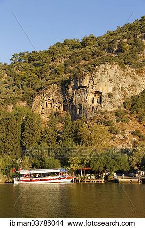 "Rock Tombs of Kaunos, early morning on the Dalyan River, Dalyan, Mugla Province, Turkish Riviera or Turquoise Coast, Aegean, Turkey, Asia" View Large Photo Image Picture - "Rock Tombs of Kaunos, early morning on the Dalyan River, Dalyan, Mugla Province, Turkish Riviera or Turquoise Coast, Aegean, Turkey, Asia". Fotosearch