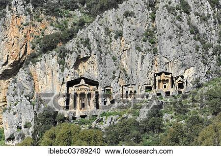 "Rock tombs of the ancient city of Kaunos near Dalyan, Mugla Province, Turkey, Asia" View Large Photo Image Stock Image - "Rock tombs of the ancient city of Kaunos near Dalyan, Mugla Province, Turkey, Asia". Fotosearch