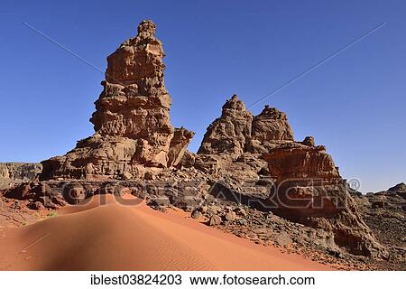 "Rock towers and sand dunes at the Cirque, Tadrart region, Tassili n’Ajjer National Park, Unesco World Heritage Site, Algeria, Sahara, North Africa, Africa" View Large Photo Image Stock Image - "Rock towers and sand dunes at the Cirque, Tadrart region, Tassili n’Ajjer National Park, Unesco World Heritage Site, Algeria, Sahara, North Africa, Africa". Fotosearch