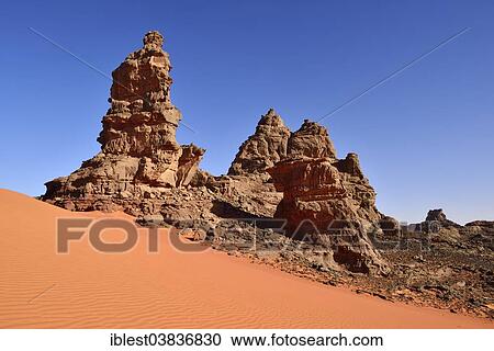 "Rock towers and sand dunes at the Cirque, Tadrart region, Tassili n’Ajjer National Park, Unesco World Heritage Site, Algeria, Sahara, North Africa, Africa" View Large Photo Image Stock Image - "Rock towers and sand dunes at the Cirque, Tadrart region, Tassili n’Ajjer National Park, Unesco World Heritage Site, Algeria, Sahara, North Africa, Africa". Fotosearch