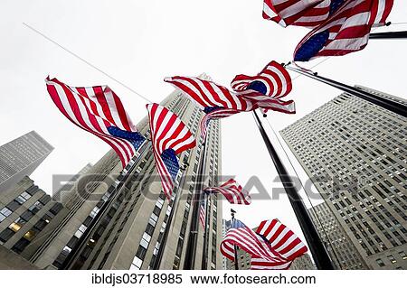 Stock Photography - "Rockefeller Center and American flags, Manhattan, New York City, New York, United States, North America". Fotosearch