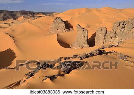 "Rocks and sand dunes of Moul Naga, Tadrart region, Tassili N'Ajjer National Park, Unesco World Heritage Site, Sahara, Algeria, Africa" View Large Photo Image Stock Photograph - "Rocks and sand dunes of Moul Naga, Tadrart region, Tassili N'Ajjer National Park, Unesco World Heritage Site, Sahara, Algeria, Africa". Fotosearch